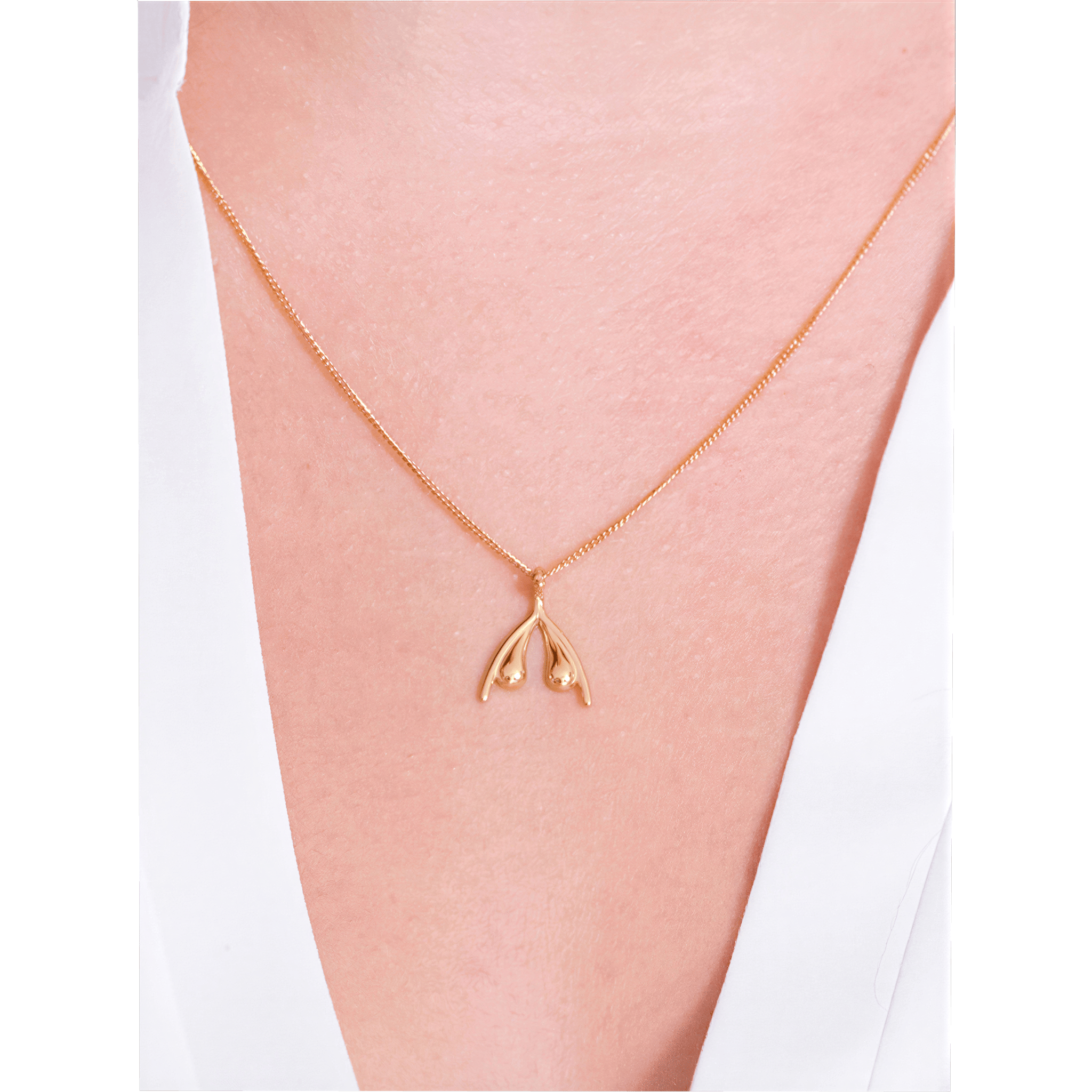 0000173435-collier-clitoris-en-or-18-carats-par-womanizer.jpg